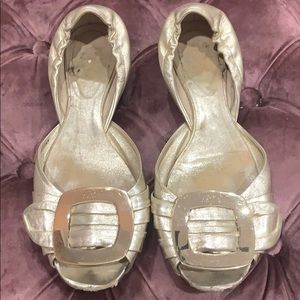 Roger Vivier gold flats